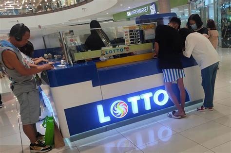 Cavite bettor wins P58.9 million lotto jackpot .